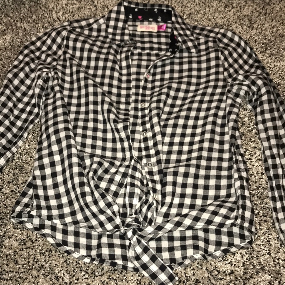 A flannel with a not in front